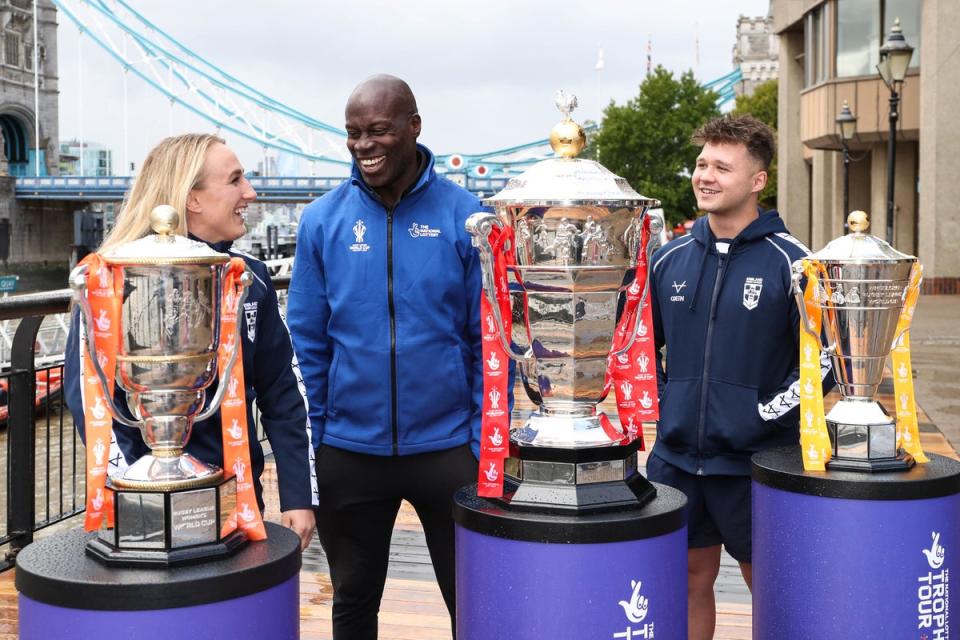 Martin Offiah, centre, with England Women’s player Jodie Cunningham, left, and England Wheelchair player Tom Halliwell (Kieran Cleeves/PA) (PA Wire)