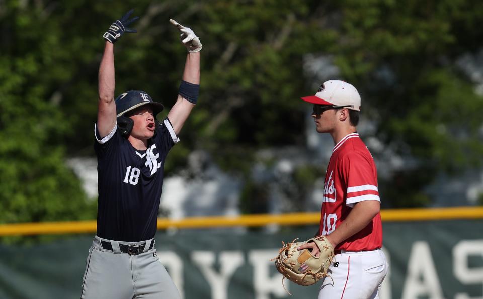 Eastchester's Aidan Shultz (18) celebrates his RBI double against Rye during baseball playoff action at Disbrow Park in Rye May 25, 2022. Eastchester won the game 3-2 in extra innings.