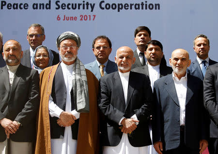 Afghan president Ashraf Ghani poses for a group photo during a peace and security cooperation conference in Kabul, Afghanistan June 6, 2017. REUTERS/Omar Sobhani