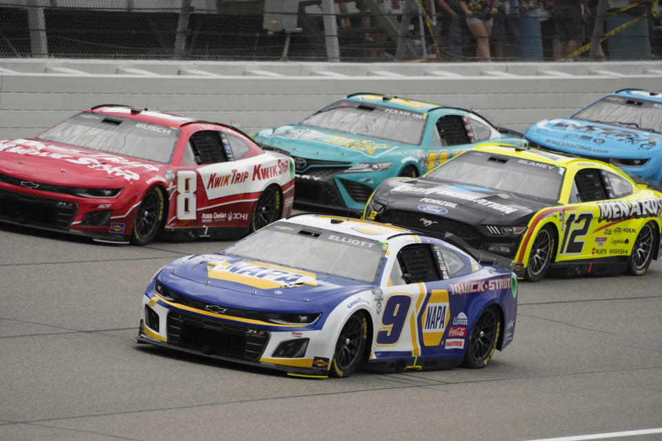 Chase Elliott (9) races with Kyle Busch (8), Denny Hamlin (11) and Ryan Blaney (12) during a NASCAR Cup Series auto race at Michigan International Speedway in Brooklyn, Mich., Sunday, Aug. 6, 2023. (AP Photo/Paul Sancya)