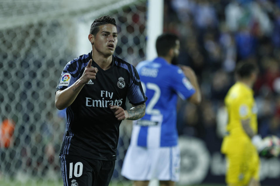 Real Madrid's James Rodriguez celebrates after scoring the opening goal against Leganes during a Spanish La Liga soccer match between Leganes and Real Madrid at the Butarque stadium in Madrid, Wednesday, April 5, 2017. (AP Photo/Francisco Seco)