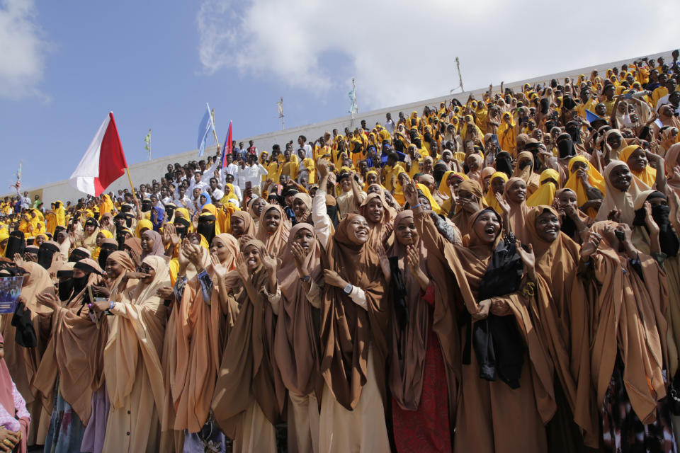 Thousands of people attend a protest rally in Mogadishu, Somalia, Wednesday Jan.3, 2024, after being angry with an agreement signed between Ethiopia and the breakaway region of Somaliland to give landlocked Ethiopia access to its shoreline. Speaking at a joint session of Somalia's federal parliament, the president of Somalia Mohamud said the agreement between Somaliland and Ethiopia is a violation of international law. Demonstrators are waving placards that reads we support the decision of our president and parliament (AP Photo/Farah Abdi Warsameh)