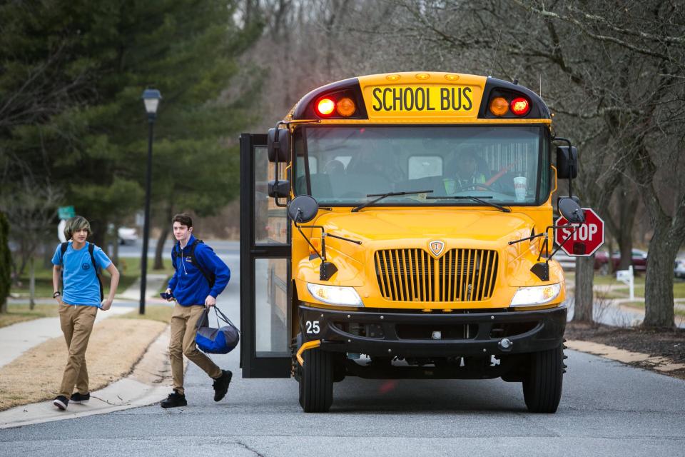Students from A.I. duPont High get dropped off in Hockessin in 2017.