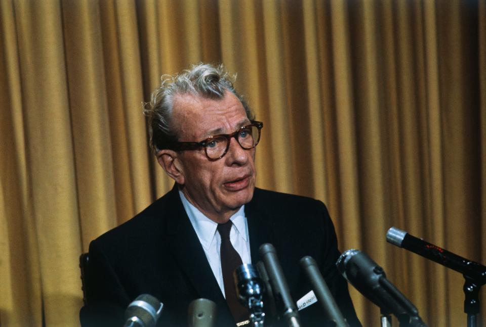 Sen. Everett M. Dirsen, Republican from Illinois, speaks in front of several microphones.