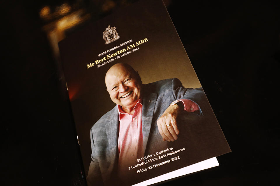 An order of service booklet is seen ahead of the state funeral for Australian actor Bert Newton at St Patrick's Cathedral on November 12, 2021 in Melbourne, Australia