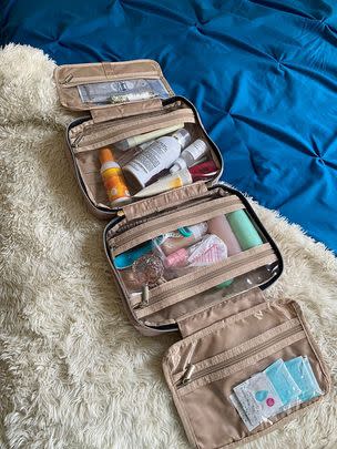 Or a waterproof toiletry bag designed to hold tons of stuff