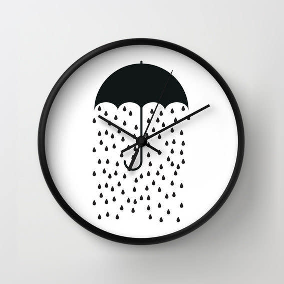 <i>Raining Umbrella Wall Clock, <a href="https://www.etsy.com/listing/200122743/raining-umbrella-wall-clock-black-and?ga_order=most_relevant&amp;ga_search_type=all&amp;ga_view_type=gallery&amp;ga_search_query=funny%20wall%20clock&amp;ref=sr_gallery_12" target="_blank">$45</a></i>