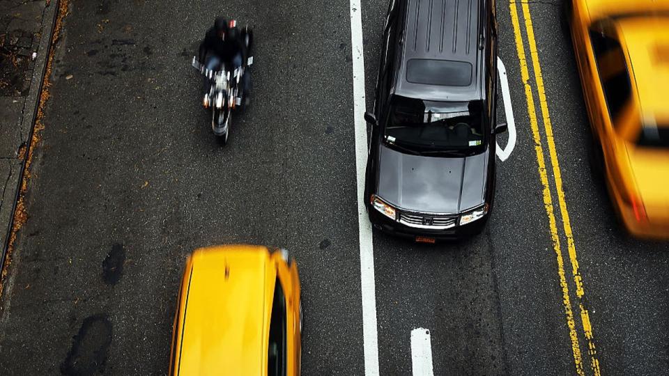 <div>NEW YORK, NY - NOVEMBER 07: Vehicles are viewed on a Manhattan Street on November 7, 2014 in New York City. A new 25 miles-per-hour speed limit went into effect city-wide today, down from 30. The new speed limit, which was signed into law by Mayor de Blasio, is the centerpiece of his Vision Zero plan which looks to drastically reduce New York City traffic deaths. Last year 291 people were killed in traffic deaths in New York City. (Photo by Spencer Platt/Getty Images)</div>