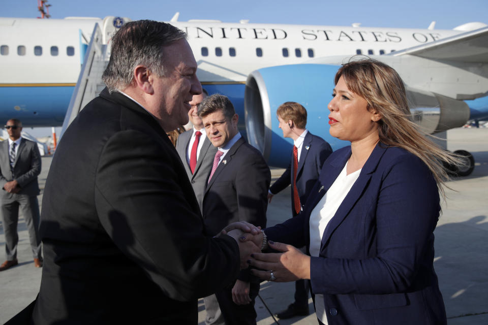 U.S. Secretary of State Mike Pompeo meets Orit Moshe, Israeli Head of North America, Official Guests Department, upon his arrival at Ben Gurion International Airport, near Tel Aviv, Israel, Wednesday, March 20, 2019. (Jim Young/Pool Image via AP)