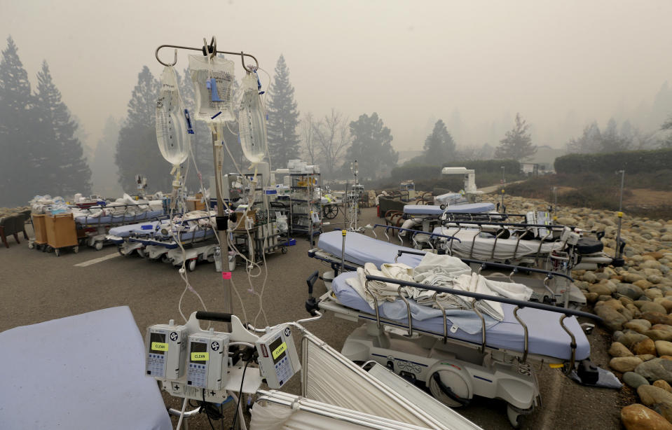 Hospital beds and other equipment sit in the parking lot outside the Feather River Hospital. (AP Photo/Rich Pedroncelli)