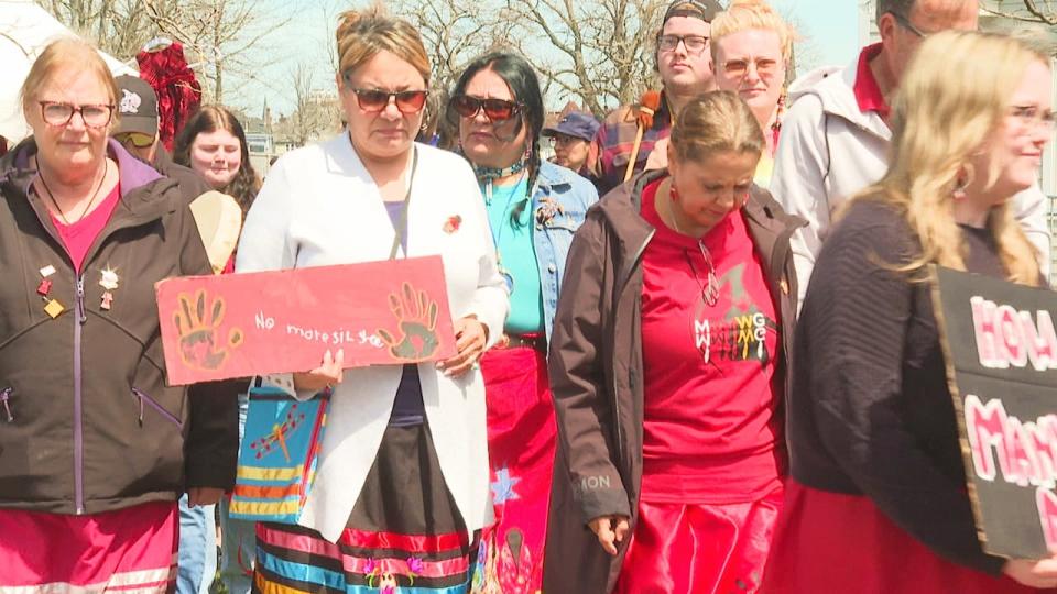 Members of P.E.I,'s Indigenous community and their supporters march Saturday in honour of lost loved ones.