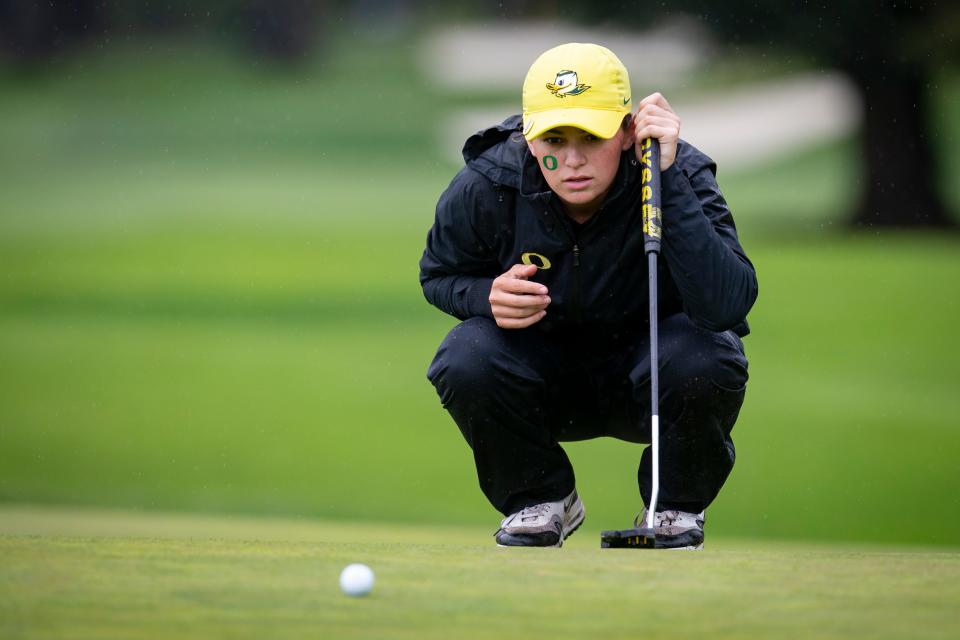 Oregon's Briana Chacon lines up a putt on the ninth hole of the Eugene Country Club on Wednesday, April 20, 2022, during the third day of the 2022 Pac-12 Women's Golf Championship.