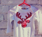 <div class="caption-credit"> Photo by: Etsy</div><b>Rudolph The Red Nosed Reindeer</b> <br> Available in 5 different sizes (from newborn to 12-18 months), this adorable Rudolph bodysuit has it's very own red butotn nose. The snowflake fabric used adds a nice festive touch. <br> <i><a href="http://www.disneybaby.com/blog/holiday-themed-bodysuits-for-baby/#slide4" rel="nofollow noopener" target="_blank" data-ylk="slk:Get it here;elm:context_link;itc:0;sec:content-canvas" class="link ">Get it here</a></i> <br>