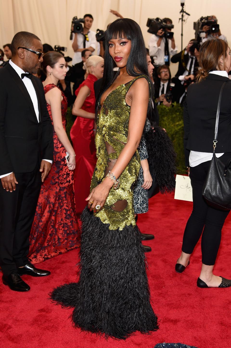 <h1 class="title">Naomi Campbell in a Burberry dress and Verdura jewelry</h1><cite class="credit">Photo: Getty Images</cite>