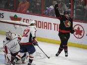 Ottawa Senators center Chris Tierney (71) skates away as he celebrates his goal against Washington Capitals goaltender Ilya Samsonov (30) second-period NHL hockey game action in Ottawa, Ontario, Monday, Oct. 25, 2021. (Justin Tang/The Canadian Press via AP)