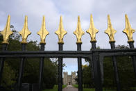 A view from Cambridge Gate outside Windsor Castle, in Windsor, England, Friday, Oct. 22, 2021. Britain's Queen Elizabeth II spent a night in a hospital for checks this week after canceling an official trip to Northern Ireland on medical advice, Buckingham Palace said Thursday. The palace said the 95-year-old British monarch went to the private King Edward VII's Hospital in London on Wednesday for "preliminary investigations." It said she returned to her Windsor Castle home at lunchtime on Thursday, "and remains in good spirits."(AP Photo/Kirsty Wigglesworth)