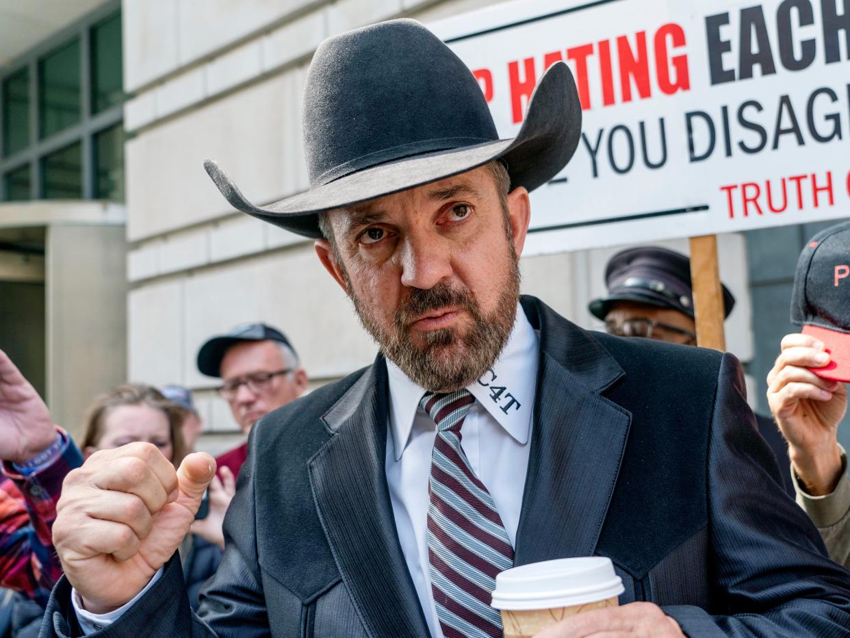 Otero County, N.M., Commissioner Couy Griffin stands outside the federal court after receiving a verdict in his trial on March 22, 2022 in Washington.