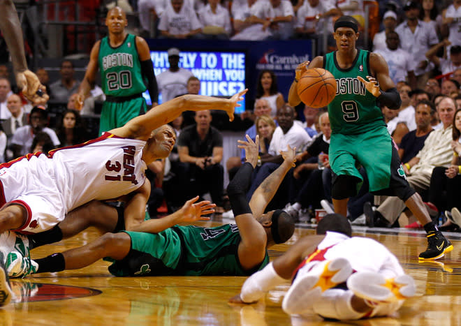 MIAMI, FL - MAY 30: Paul Pierce #34 of the Boston Celtics passes the ball to Rajon Rondo #9 in the second half against Shane Battier #31 of the Miami Heat in Game Two of the Eastern Conference Finals in the 2012 NBA Playoffs on May 30, 2012 at American Airlines Arena in Miami, Florida. NOTE TO USER: User expressly acknowledges and agrees that, by downloading and or using this photograph, User is consenting to the terms and conditions of the Getty Images License Agreement. (Photo by Mike Ehrmann/Getty Images)