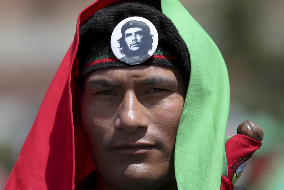 An indigenous man marches during a national strike in Bogota, Colombia, Wednesday, Dec. 4, 2019. Colombia’s recent wave of demonstrations began with a massive strike on Nov. 21 that drew an estimated 250,000 people to the streets. Protests have continued in the days since but at a much smaller scale. (AP Photo/Fernando Vergara)