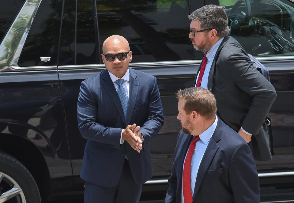 Waltine "Walt" Nauta, former President Trump's valet and co-defendant (left), arrives at the federal courthouse in Fort Pierce for the Trump/Nauta pre-trial hearing on Tuesday, July 18, 2023.