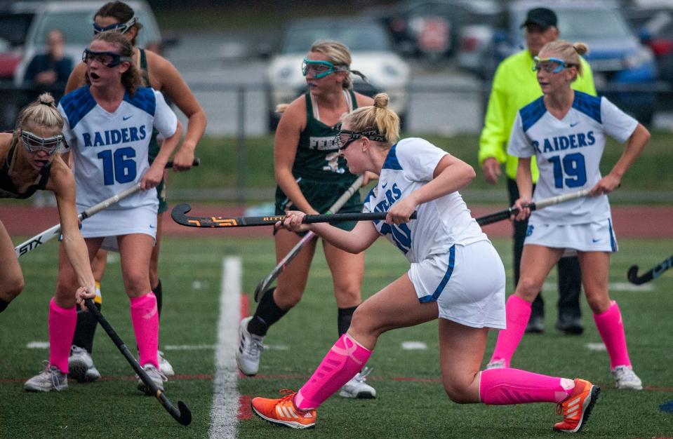 Dover-Sherborn Regional High School junior Avery Bent takes a shot against Bishop Feehan, Oct. 17, 2022.