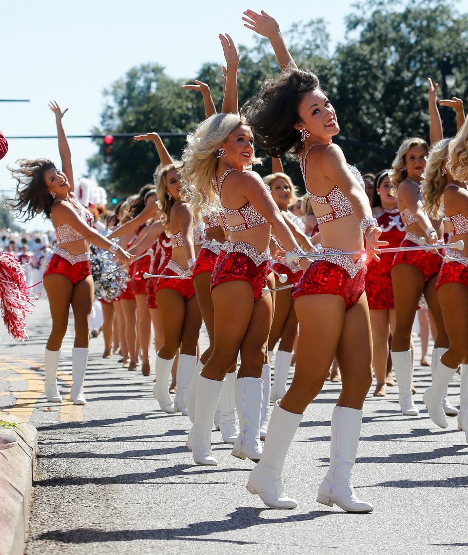 Million Dollar Band Crimsonettes take part in the University of Alabama homecoming parade in downtown Tuscaloosa Saturday, Oct. 23, 2021. [Staff Photo/Gary Cosby Jr.]