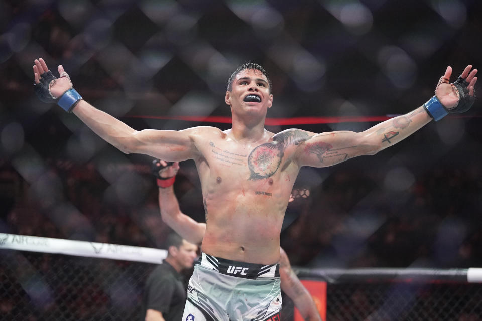 Apr 15, 2023; Kansas City, Missouri, USA; Daniel Zellhuber (blue gloves) reacts after the fight against Lando Vannata (red gloves) during UFC Fight Night at T-Mobile Center. Mandatory Credit: Denny Medley-USA TODAY Sports