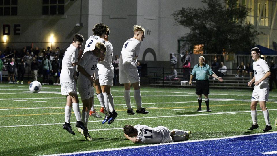 American Heritage's wall reacts as the ball ricochets during a set-piece free kick in Heritage's half of play. The Stallions played Somerset Canyons to a 2-2 draw in Wednesday's match.