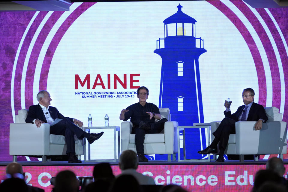 Dean Kamen, founder of First, center, speaks during a panel discussion with Arkansas Gov. Asa Hutchinson, left, and Patrick Gelsinger, CEO of Intel, at the National Governors Association summer meeting, Thursday, July 14, 2022, in Portland, Maine. (AP Photo/Robert F. Bukaty)