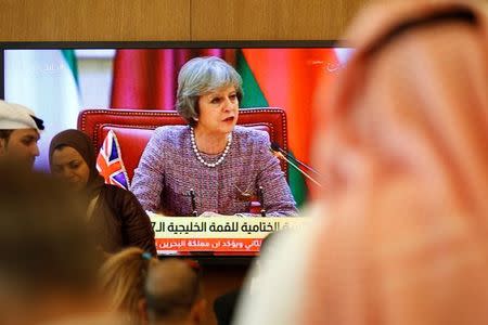 British Prime Minister Theresa May speaks as journalists take notes during the first Gulf Cooporative Council's (GCC) " GCC British Summit", in Sakhir Palace Bahrain, December 7, 2016. REUTERS/Hamad I Mohammed/Files