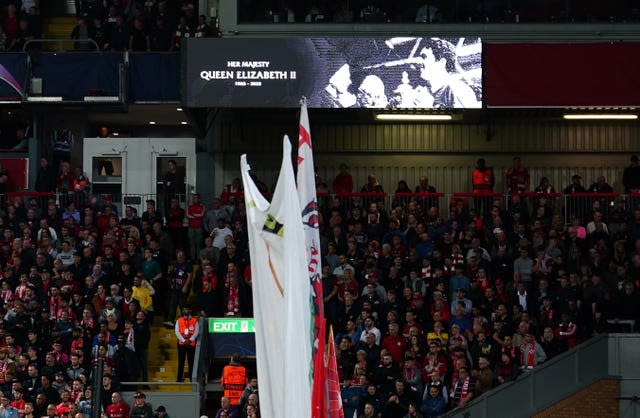 A tribute to the Queen is displayed on the big screen at Anfield