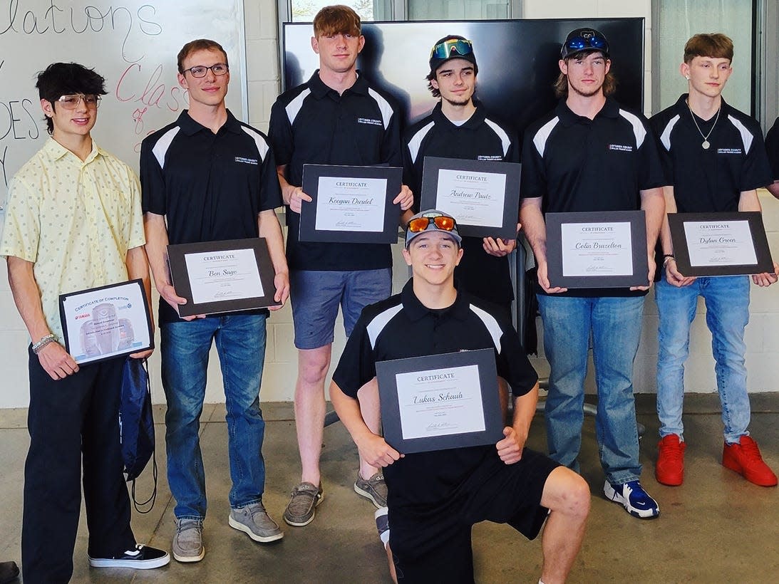 Egiht Ottawa County high school seniors graduated from the 2021-2022 Skilled Trades Academy.