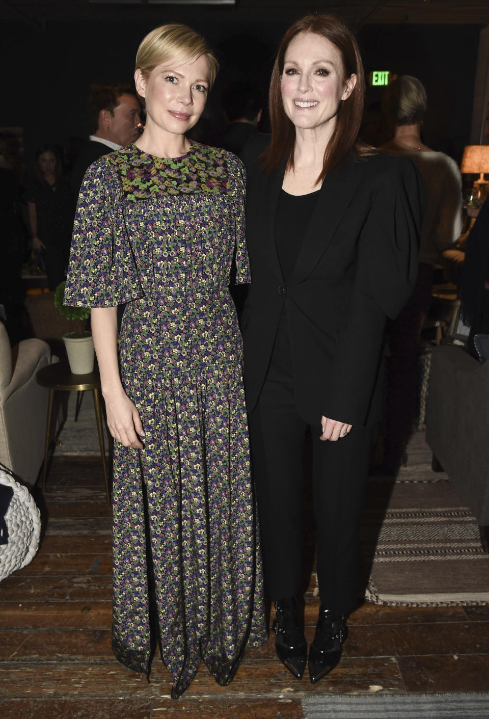 IMAGE DISTRIBUTED FOR CHASE SAPPHIRE - Actress Julianne Moore, right, and actress Michelle Williams seen at the Chase Sapphire hosted "After the Wedding" after party at Chase Sapphire on Main at Sundance Film Festival 2019 on Thursday January 24, 2019 in Park City, Utah. (Photo by Dan Steinberg/Invision for Chase Sapphire/AP Images)