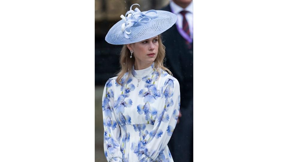 Lady Louise Windsor in blue hat and floral dress at  Westminster Abbey coronation of King Charles