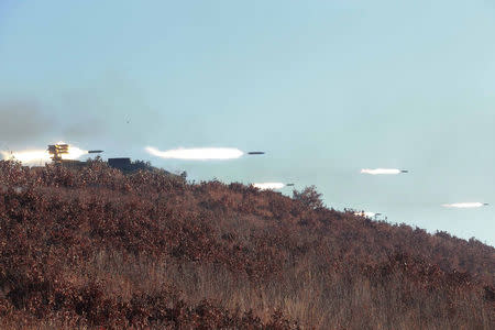 A combat drill of the service personnel of the special operation battalion of KPA Unit 525 is seen in this undated photo released by North Korea's Korean Central News Agency (KCNA) in Pyongyang on December 11, 2016. KCNA via REUTERS