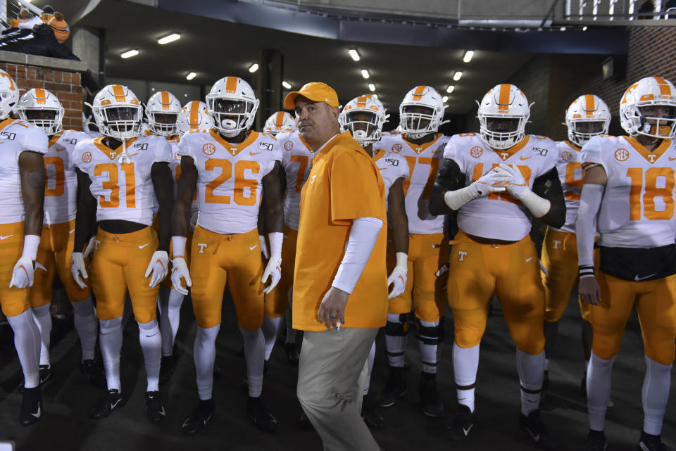 COLUMBIA, MO - NOVEMBER 23: Head coach Jeremy Pruitt of the Tennessee Volunteers prepares to lead his team to the field against the Missouri Tigers at Memorial Stadium on November 23, 2019 in Columbia, Missouri. (Photo by Ed Zurga/Getty Images)