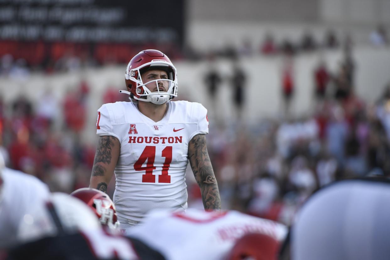 Houston place kicker Bubba Baxa (41) lines up for a field goal against Texas Tech during overtime of an NCAA college football game Saturday, Sept. 10, 2022, in Lubbock, Texas. (AP Photo/Justin Rex)