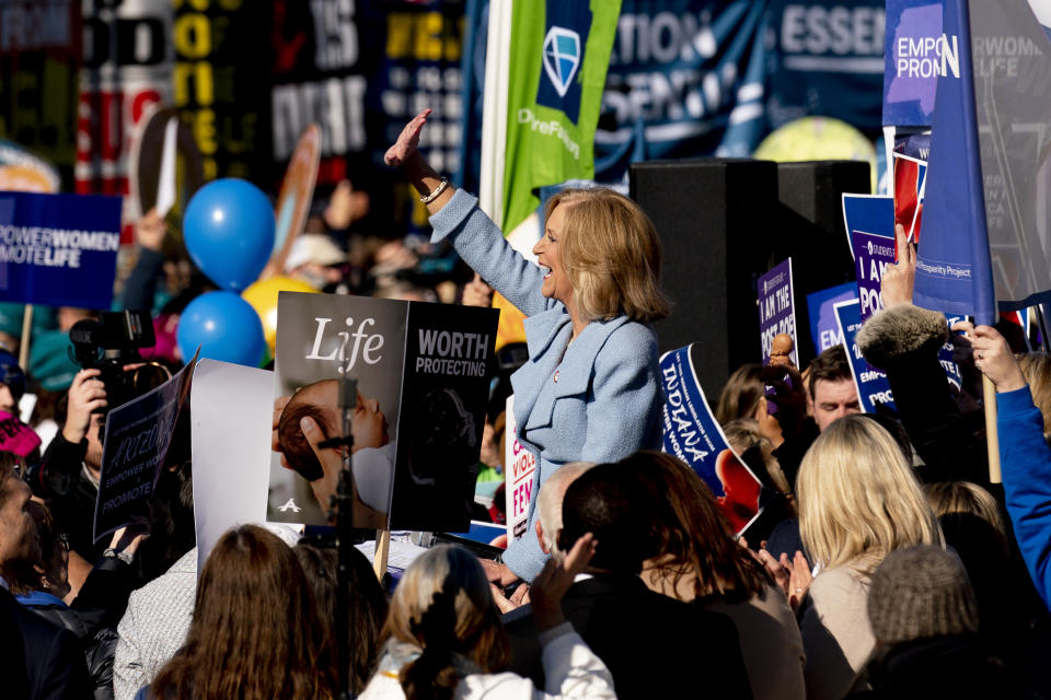 Mississippi Attorney General Lynn Fitch speaks to anti-abortion protesters in front of the U.S. Supreme Court, Wednesday, Dec. 1, 2021, in Washington, after the court hears arguments in a case from Mississippi, where a 2018 law would ban abortions after 15 weeks of pregnancy, well before viability. (AP Photo/Andrew Harnik)