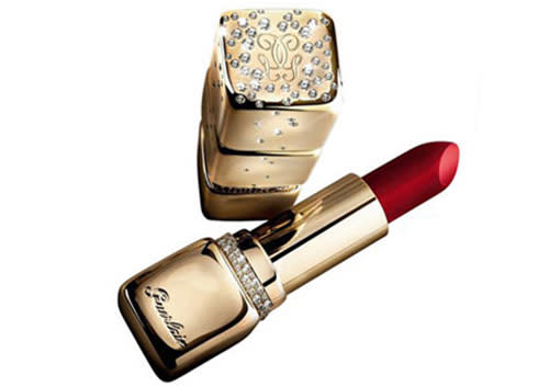 <b>Guerlain Kiss Kiss Gold and Diamonds</b><br><br>In 2005 Olivier Echaudemaison and Guerlain's cosmetic designer Herve Van Der Stareten hand crafted a lipstick encrusted with gold and diamonds. <br><br>The limited edition lipstick's sparkling case is interchangeable with a selection on 15 lipstick colors to choose from. <br><br>The lucky few that got their hands on this £36,000 beauty product had the option to engrave the piece or add other stones.