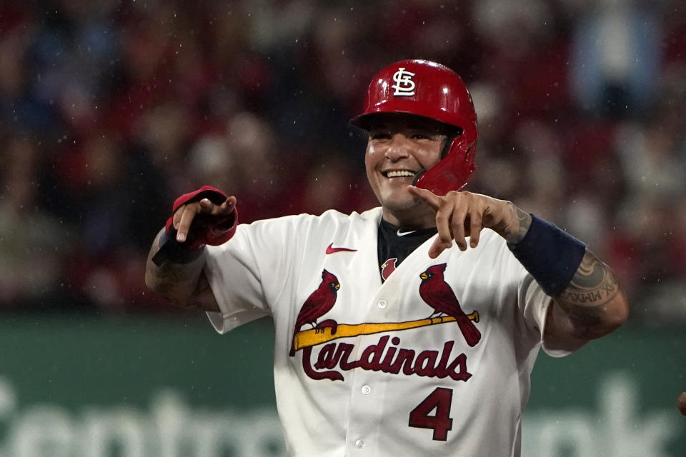 St. Louis Cardinals' Yadier Molina smiles after stealing second base during the sixth inning of a baseball game against the Arizona Diamondbacks Thursday, April 28, 2022, in St. Louis. (AP Photo/Jeff Roberson)