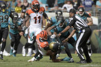 <p>Cincinnati Bengals wide receiver A.J. Green (18) takes down Jacksonville Jaguars cornerback Jalen Ramsey (20) during a fight in the first half of an NFL football game Sunday, Nov. 5, 2017, in Jacksonville, Fla. (AP Photo/Phelan M. Ebenhack) </p>