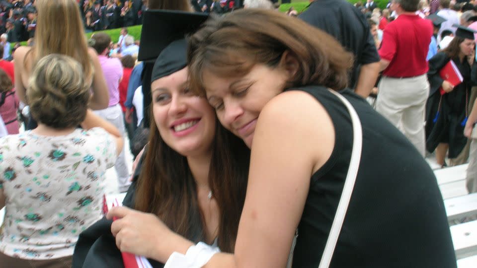 Lori hugs her daughter Shanna at Shanna's graduation from the University of Georgia. - Ric Ward/CNN