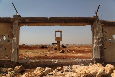 A damaged wall, part of the Menagh airport, is seen in the Aleppo Countryside May 31, 2014. REUTERS/Hamid Khatib