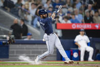 Tampa Bay Rays' Amed Rosario is hit by the ball after fouling it off during the fifth inning of the team's baseball game against the Toronto Blue Jays on Friday, May 17, 2024, in Toronto. (Christopher Katsarov/The Canadian Press via AP)