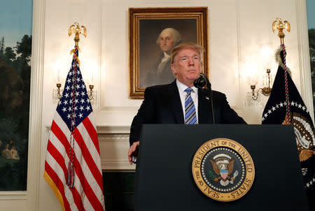 U.S. President Donald Trump speaks about the mass shooting at a Florida high school in a national address from the White House in Washington, U.S., February 15, 2018. REUTERS/Leah Millis