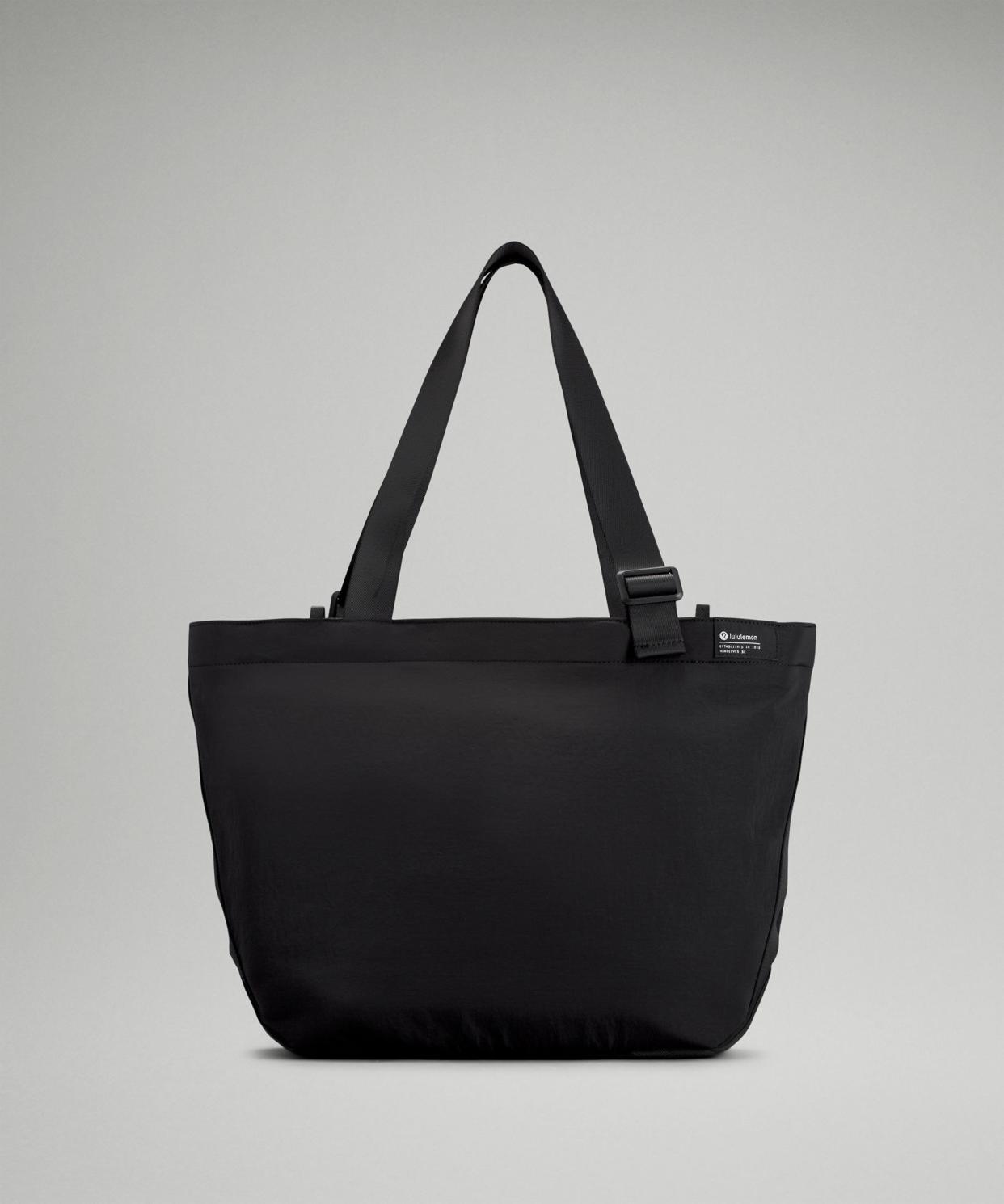 <p><a href="https://go.redirectingat.com?id=74968X1596630&url=https%3A%2F%2Fshop.lululemon.com%2Fp%2Fbags%2FClean-Lines-Tote-Bag-22L&sref=https%3A%2F%2F" rel="nofollow noopener" target="_blank" data-ylk="slk:Shop Now;elm:context_link;itc:0;sec:content-canvas" class="link rapid-noclick-resp">Shop Now</a></p><p>Clean Lines Tote Bag </p><p>$88.00</p><p>lululemon.com</p>