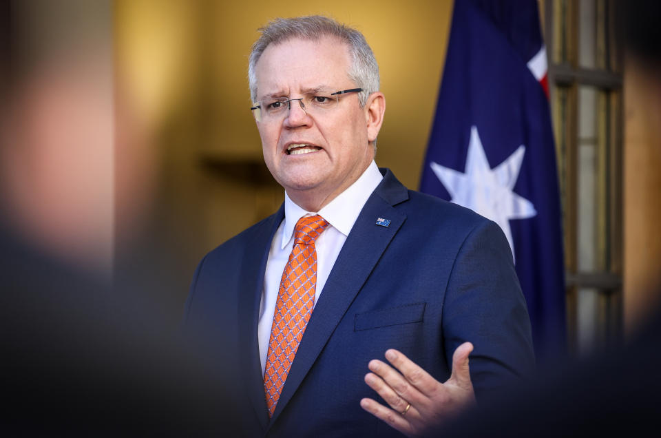 CANBERRA, AUSTRALIA - JULY 9: Australian Prime Minister Scott Morrison speaks during a media conference at Parliament House on July 9, 2020 in Canberra, Australia. Australia has suspended its extradition policy with Hong Kong in light of recent changes to security laws. Australia will also offer visas for residents of Hong Kong to apply for residency in Australia. (Photo by David Gray/Getty Images)