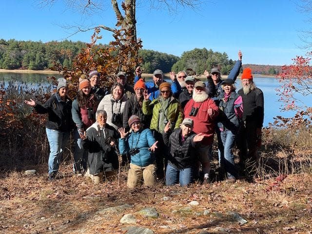 A large group attends an Athol Bird & Nature Club hike at Quabbin Reservoir.