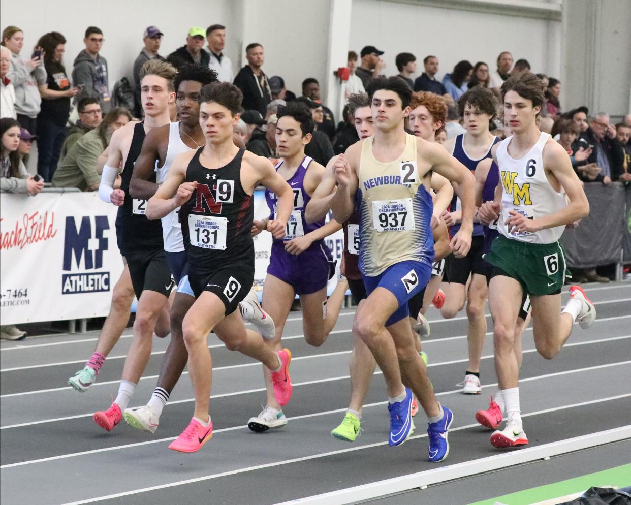 Matthew Schutzbank from Nyack and Brady Danyluk from Newburgh Free Academy compete in the boys 1000 meter run at the 2024 New York State Indoor Track and Field Championships at the Ocean Breeze Athletic Complex in Staten Island, March 2, 2024.