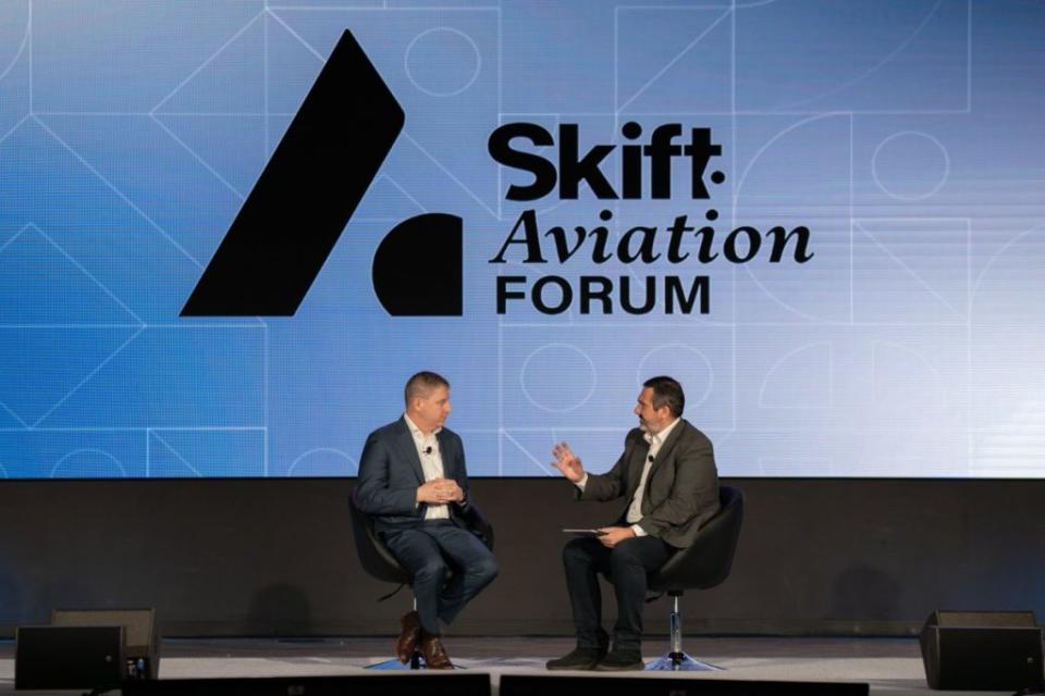 Azul Brazilian Airlines CEO John Rodgerson (left) talking with WestJet Aviation Advisor and board bember Alex Cruz at Skift Aviation Forum 2022 in Dallas-Fort Worth. Source: Skift. Dylan Pacholek / Skift